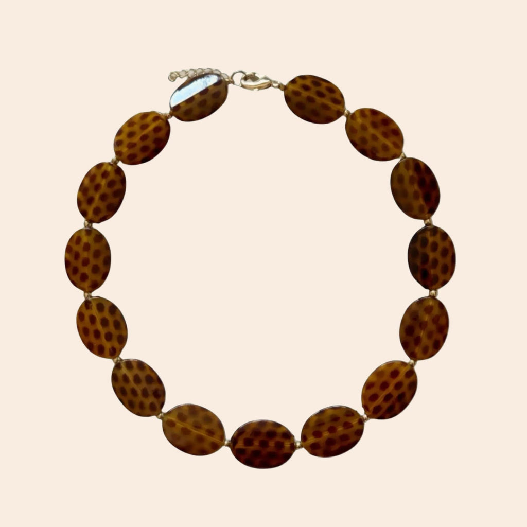 CHEETAH Necklace - exact original design on cream background