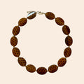 CHEETAH Necklace - exact original design on cream background